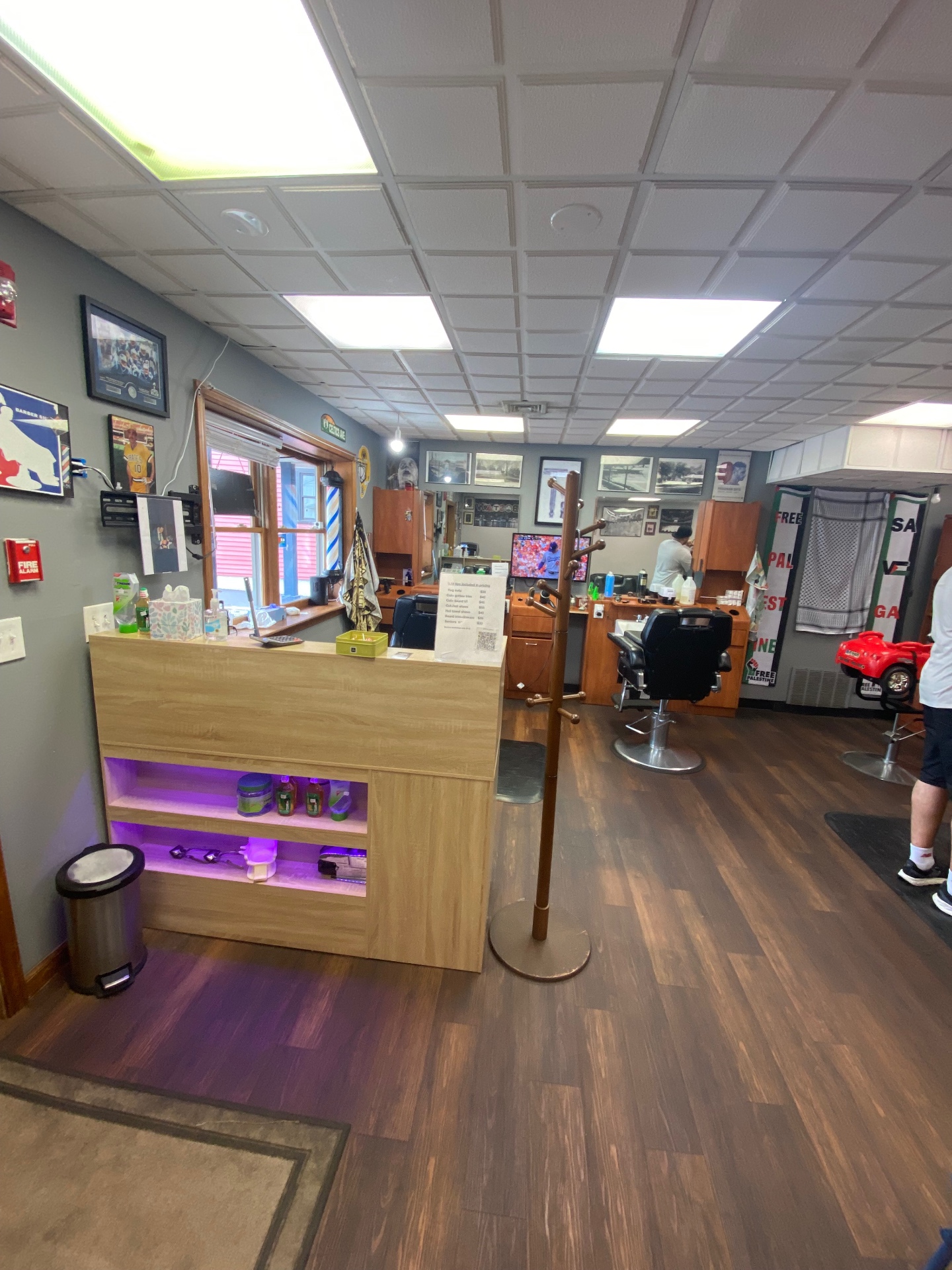 Front desk and barber chairs inside Moe's Barber Shop