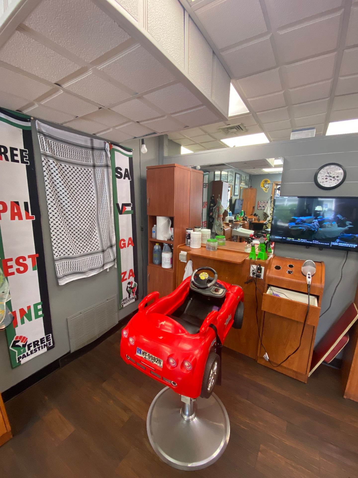 Kid-friendly red car barber chair